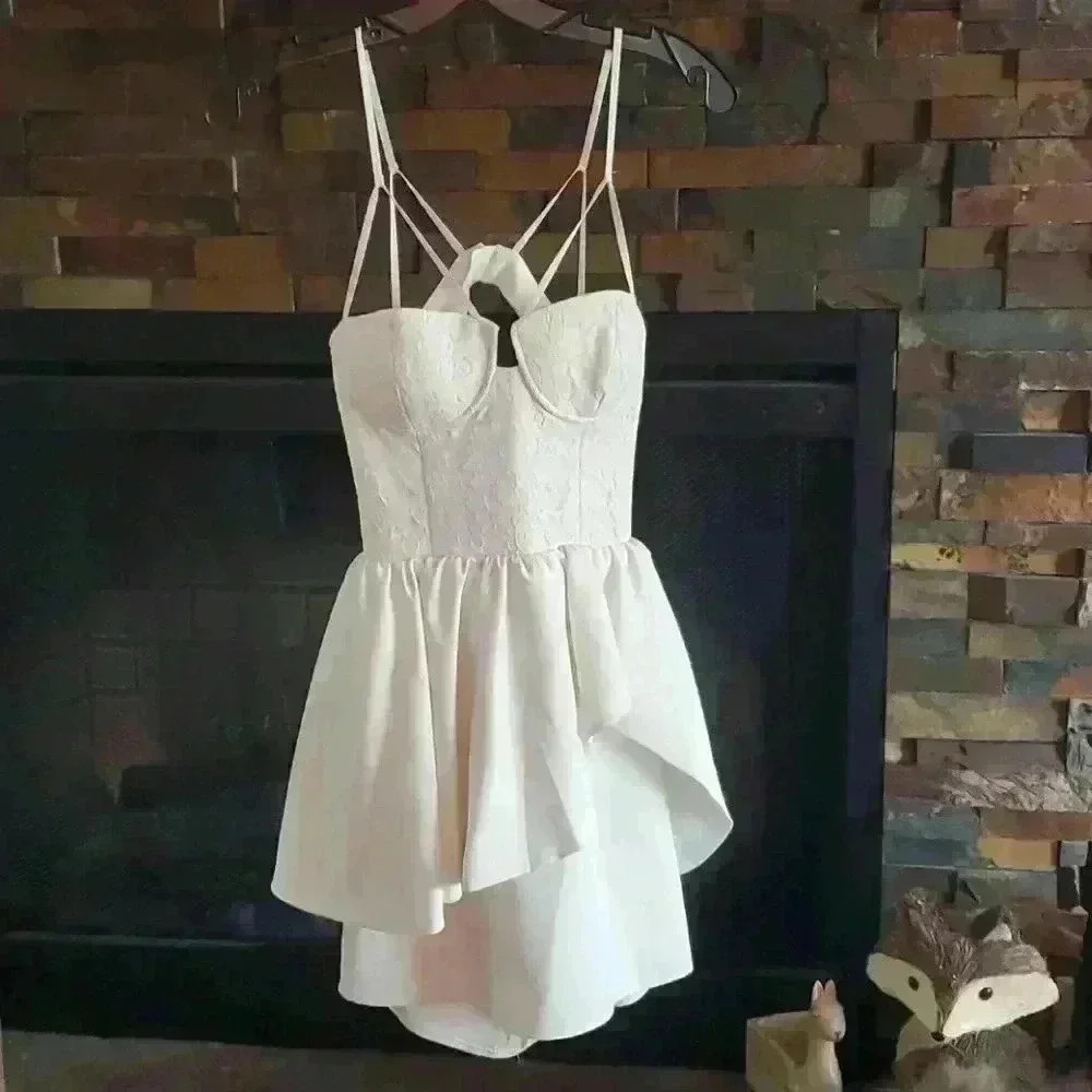 Lace bustier dress with asymmetrical skirt